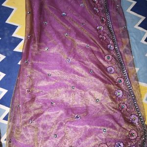 Net saree in purple colour havingg 2 shining shade