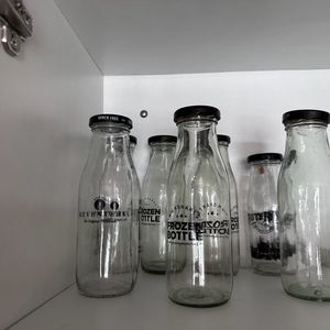 7 Bottles + 1 Glass