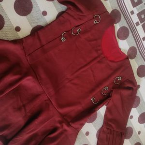 A Maroon Colored Top