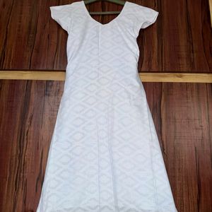 Printed white coloured Kurti.