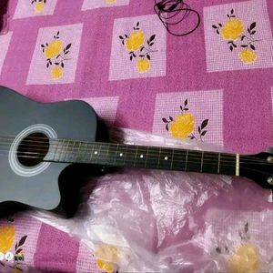 Guitar With Bag And Extra String