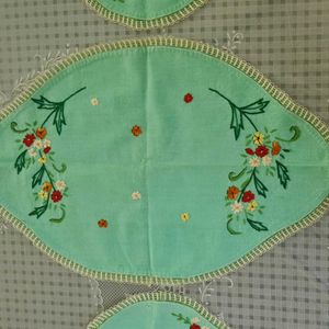 A Set of 3 hand embroidered table mats