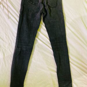 Faded Black Jeans With Knee Ripped