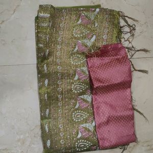 Green Colour Tissue Saree With Blouse Piece