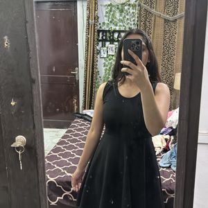 Black Flared Dress With Back Cutout