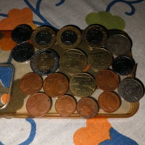 Saudi Riyal And Halalas/ German Euro Cent