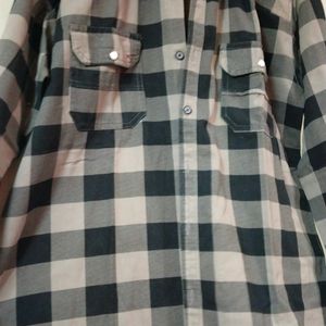 A Checkered Black And white Shirt With Full Sleeve