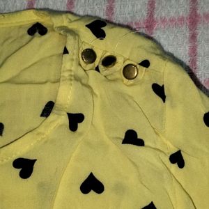 Yellow Round Neck Shirt With Black Heart Print