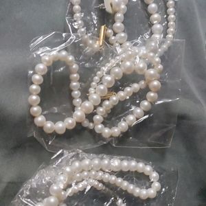 Channel Pearl Necklaces