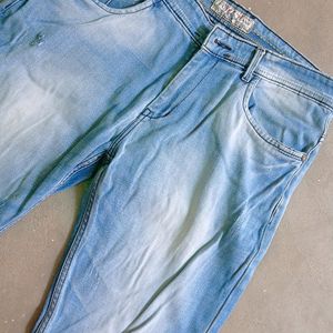 Man Branded Blue Jeans