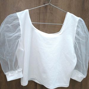 A White Croptop Or Blouse