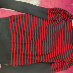 A Red And Black Stretchable Top Of Size L Which ca