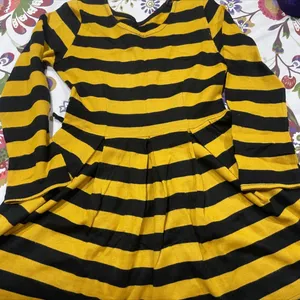 Dress With Mustard Black Stripes And A Belt