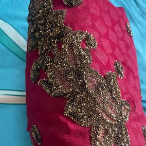 Red saree with golden zari work