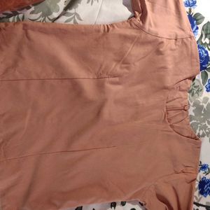 It Is a Peach Coloured Top . I Hardly Used This.