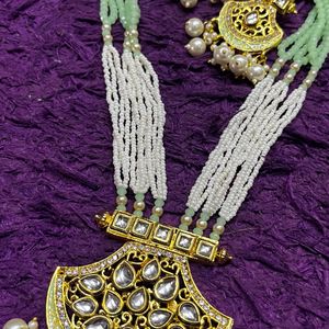 Enduring Charm: Long Pearl Necklace & Earrings Set