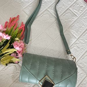 Green Roll shaped sling bag
