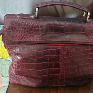 Hi-design embossed leather handbag