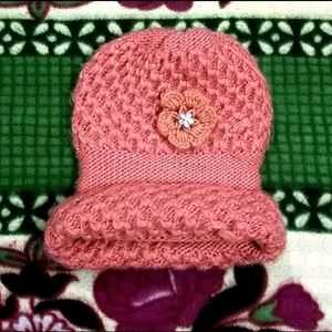 IT IS A PINK COLOR WARM WOOL TOPI.....