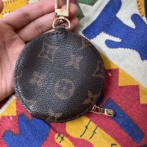 Louis Vuitton Sling Bag + Pouch