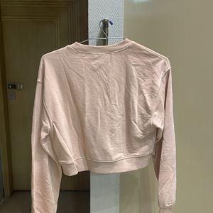 baby pink sweatshirt