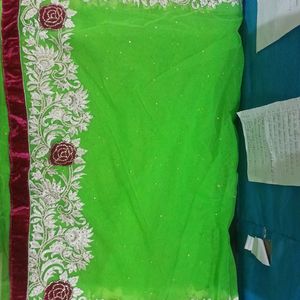 Net Saree, Neon Green Color With Heavy Embroidery.