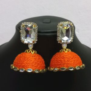 Stone Stud Orange Jhumkas