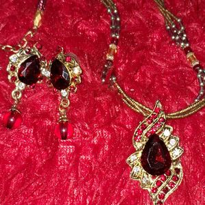 Maroon Kundan And Stone Necklace