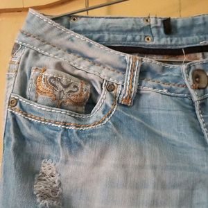 Ripped low-rise Denim