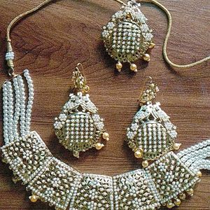 Beautiful Necklace with earrings and tikka set