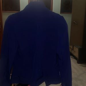 A blue office wear Jacket or  coat