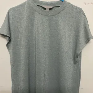 shimmery light sea green top with capped sleeves