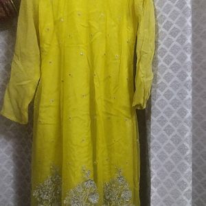 A Very New Yellow Coloured Net Suit With Pajami