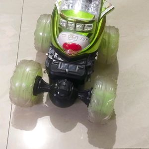 Movable Green And Black Toy Car