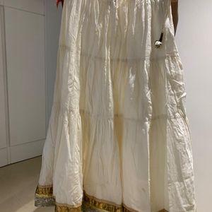 Cream Skirt With Golden Border And Latkans