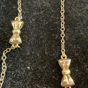 Long Chain With Bow Detail