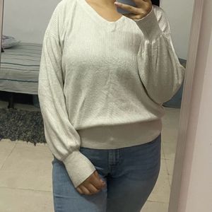 cream sweater