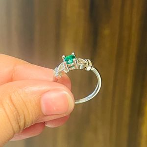 Green Stoned Ring With hearts on sides