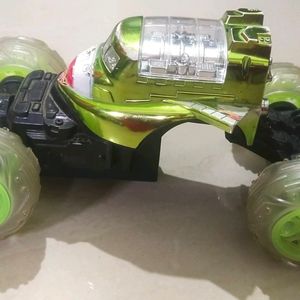 Movable Green And Black Toy Car