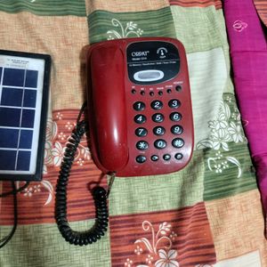 Solar Plate With Telephone As Freebies