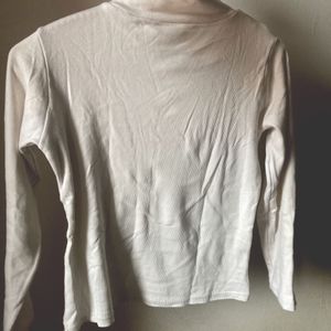 White women's turtleneck.