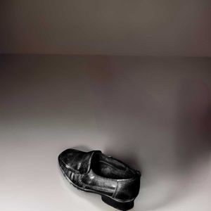 Black leather loafers