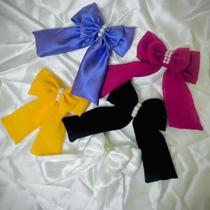 Pack Of Trendy 5 Tail Bow Clips