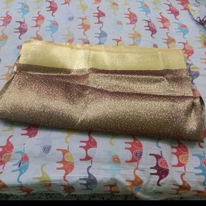 Golden Zari Knitting Work On Brown Base saree