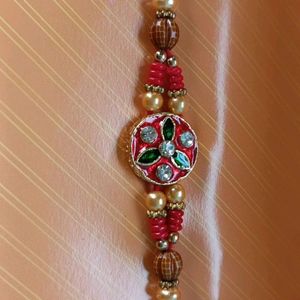 Stone Petaled Rakhi For Raksha Bandhan