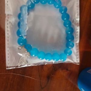 Blue Coloured Glassy Plastic Bead Bracelet From