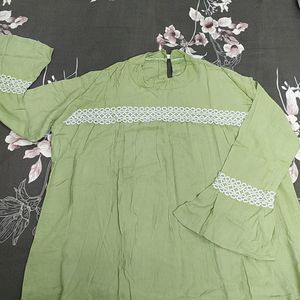 A Beautiful Greenish Color White Embroidered Top