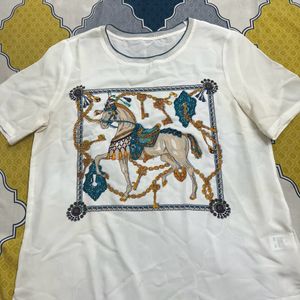 trendy horse print top