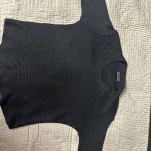 A Classic Black Crewneck Sweater