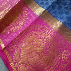 A Pattu Navy Blue nd Pink Coloured Saree.